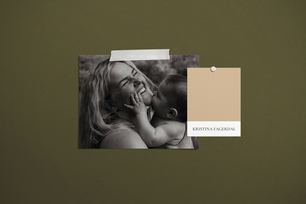 Smiling woman and baby in black and white photo